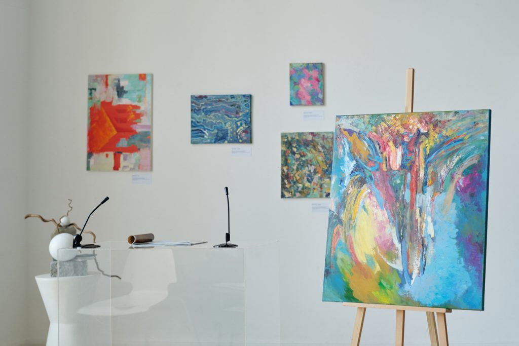 A vibrant painting displayed on an easel, showcasing artistic talent and creativity, ideal for artists of all levels